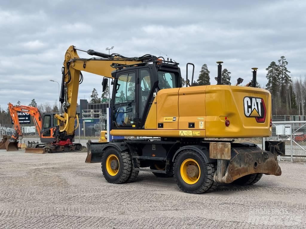CAT M 318 Escavatori gommati
