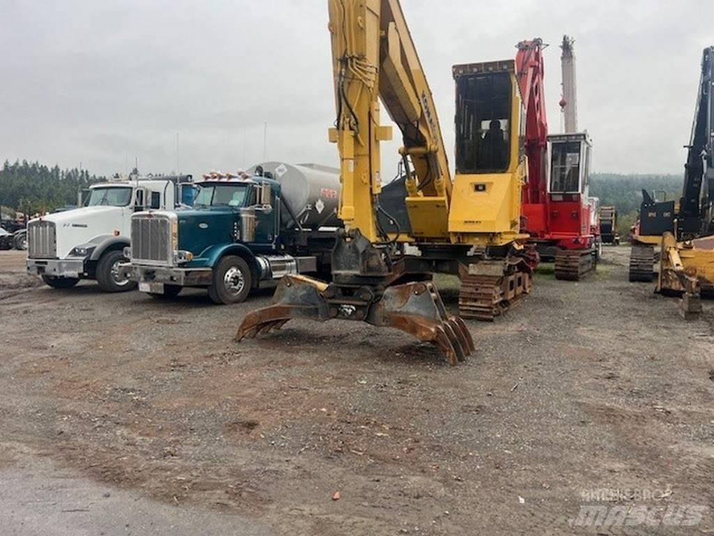 Komatsu PC210LL-10 Caricatronchi con base su rimorchio
