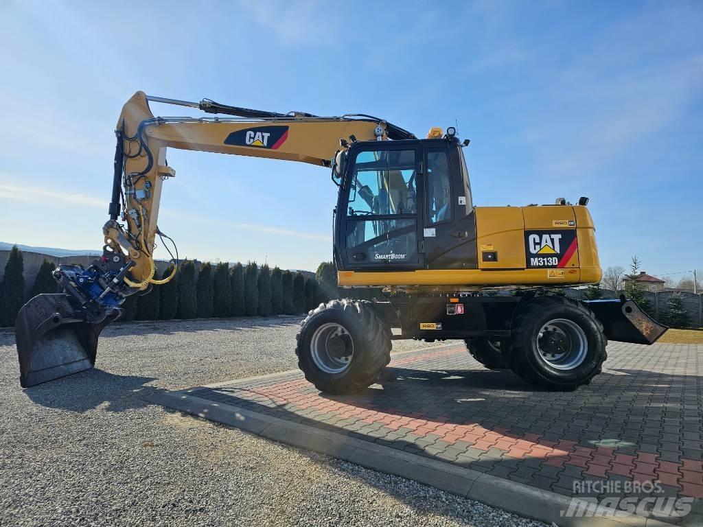 CAT M 313 D Escavatori gommati