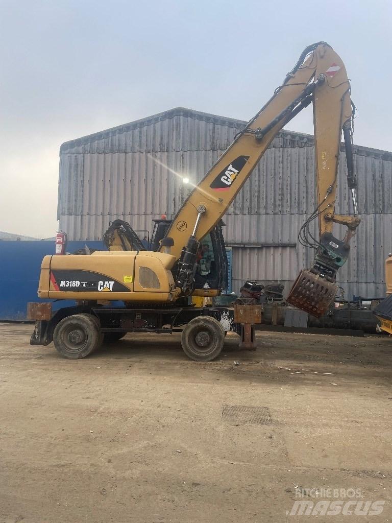CAT 318 dmh Movimentazione Materiali - Altro