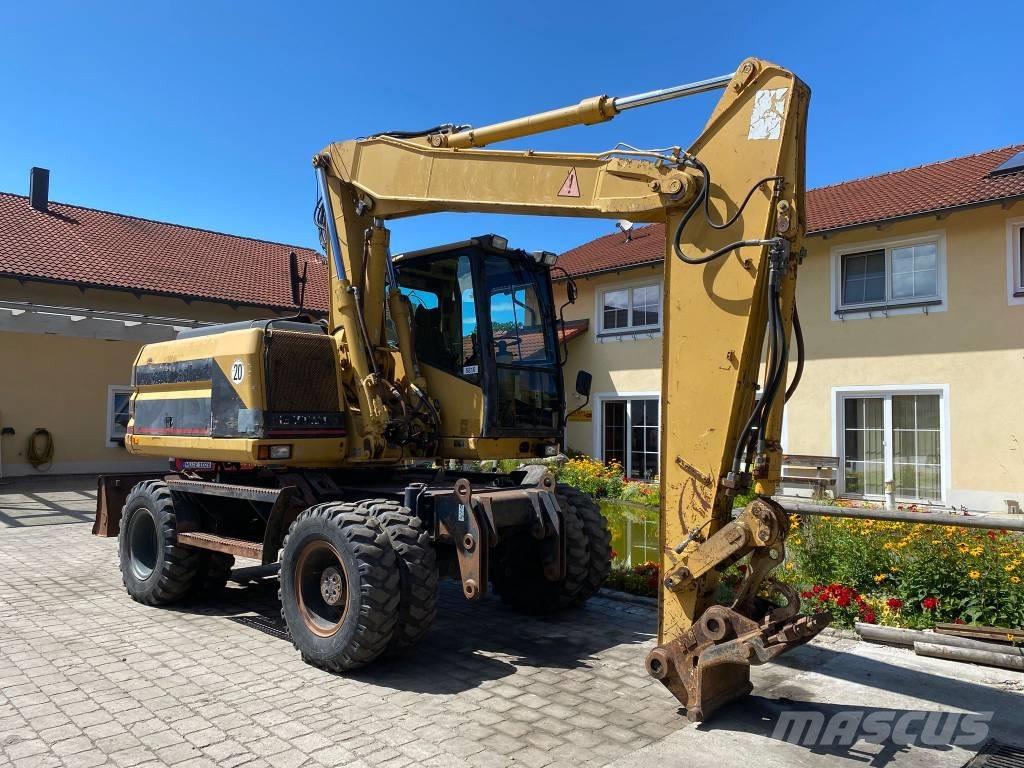 CAT M 312 Escavatori gommati