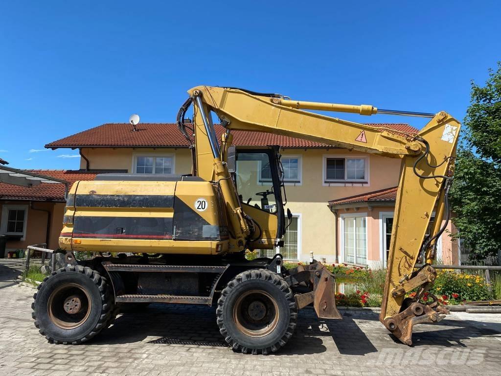 CAT M 312 Escavatori gommati