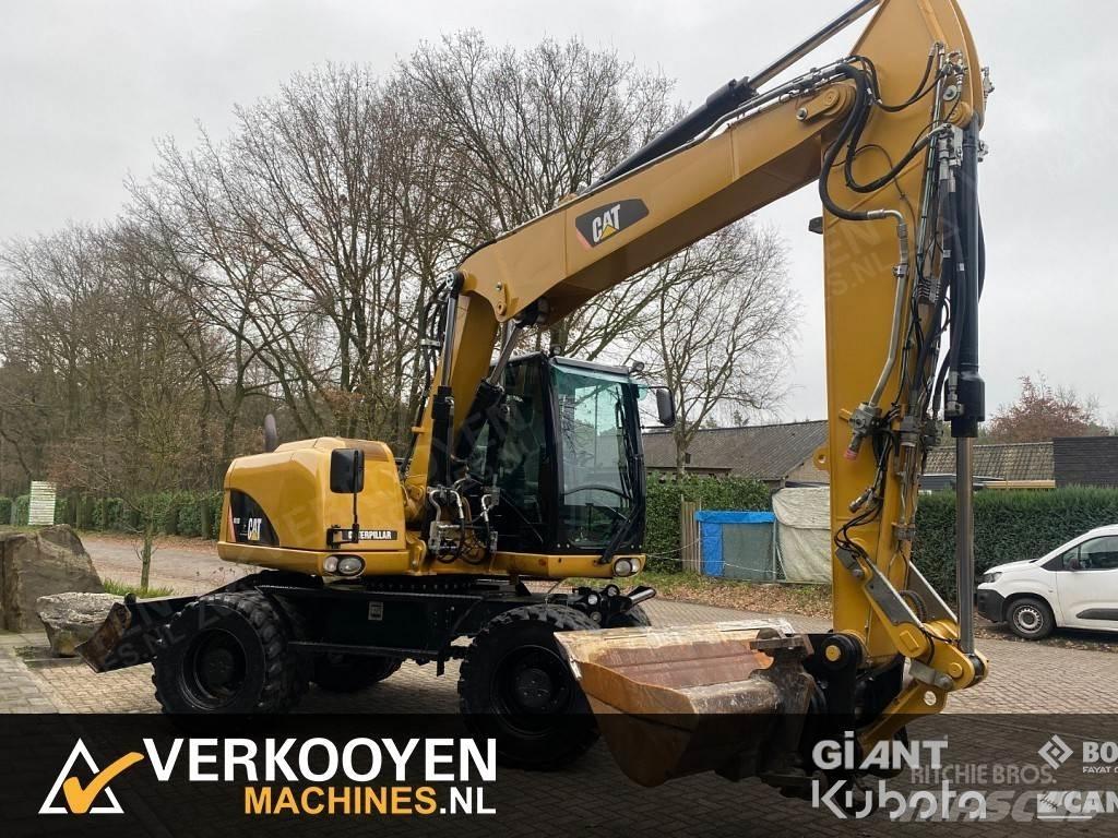 CAT M313D Escavatori gommati