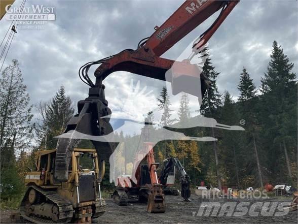 Madill 3800 Caricatronchi con base su rimorchio