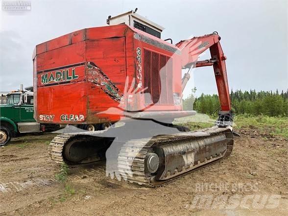Madill 3800B Caricatronchi con base su rimorchio