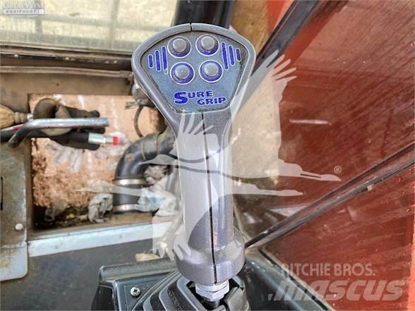 Madill 3800B Caricatronchi con base su rimorchio