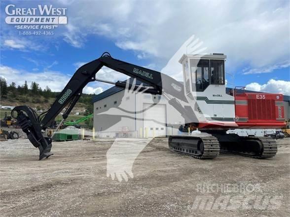 Madill 3800C Caricatronchi con base su rimorchio