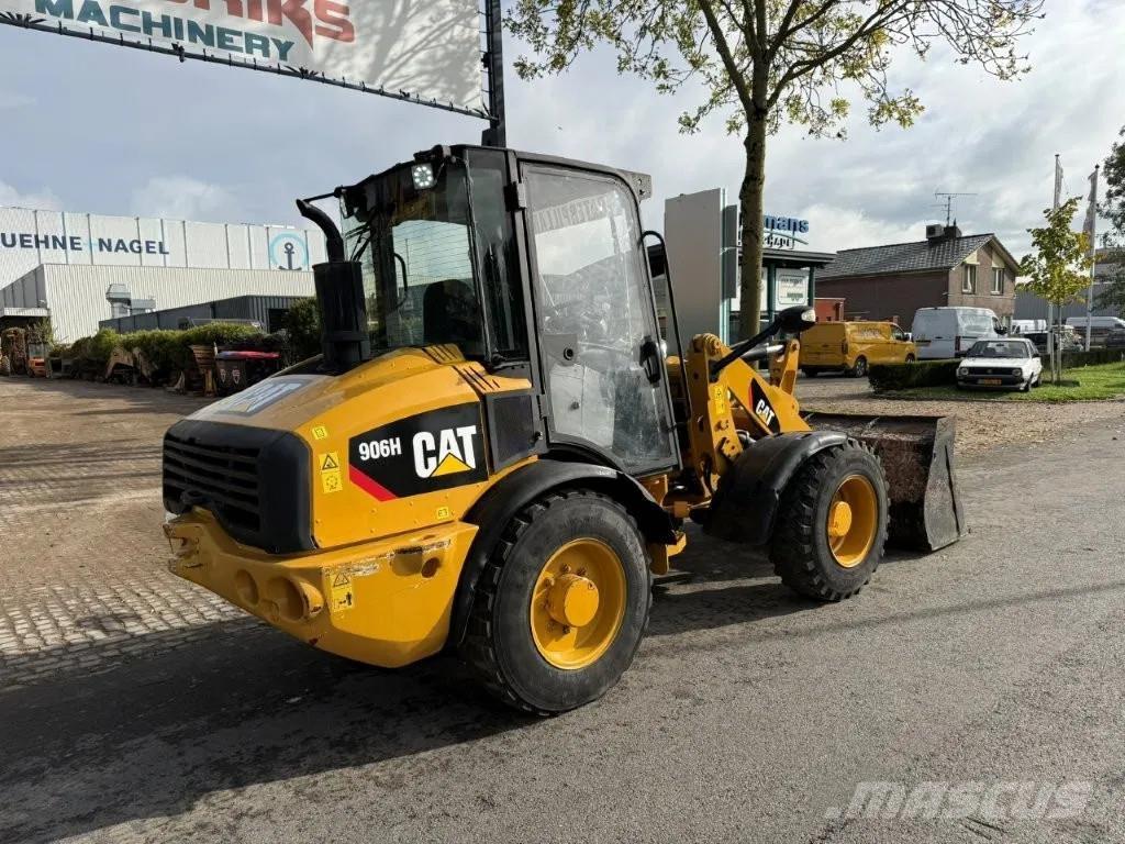 CAT 906H Pale gommate