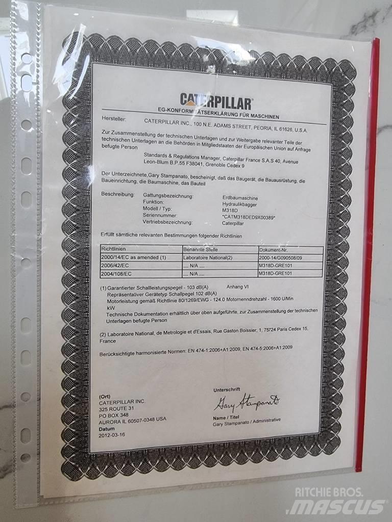 CAT 318D Movimentazione rifiuti