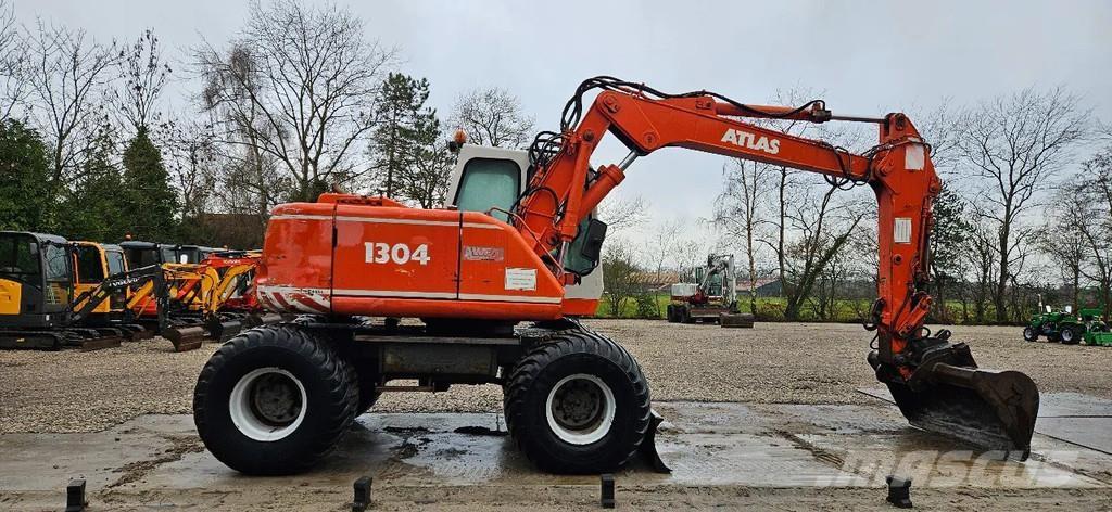 Atlas 1304 Escavatori gommati
