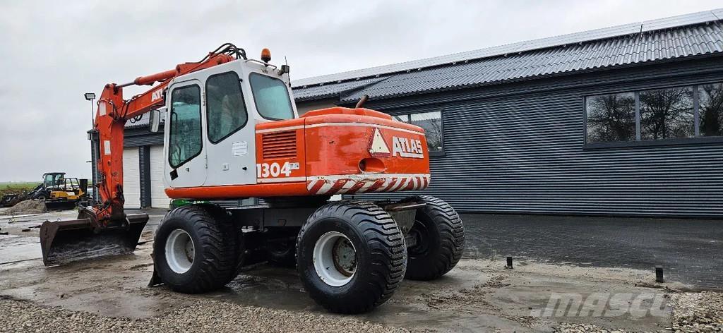 Atlas 1304 Escavatori gommati