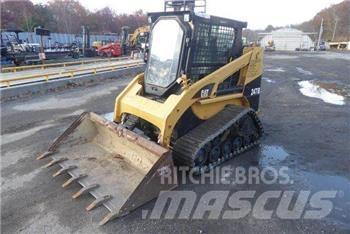 CAT 247B Mini Pale Gommate