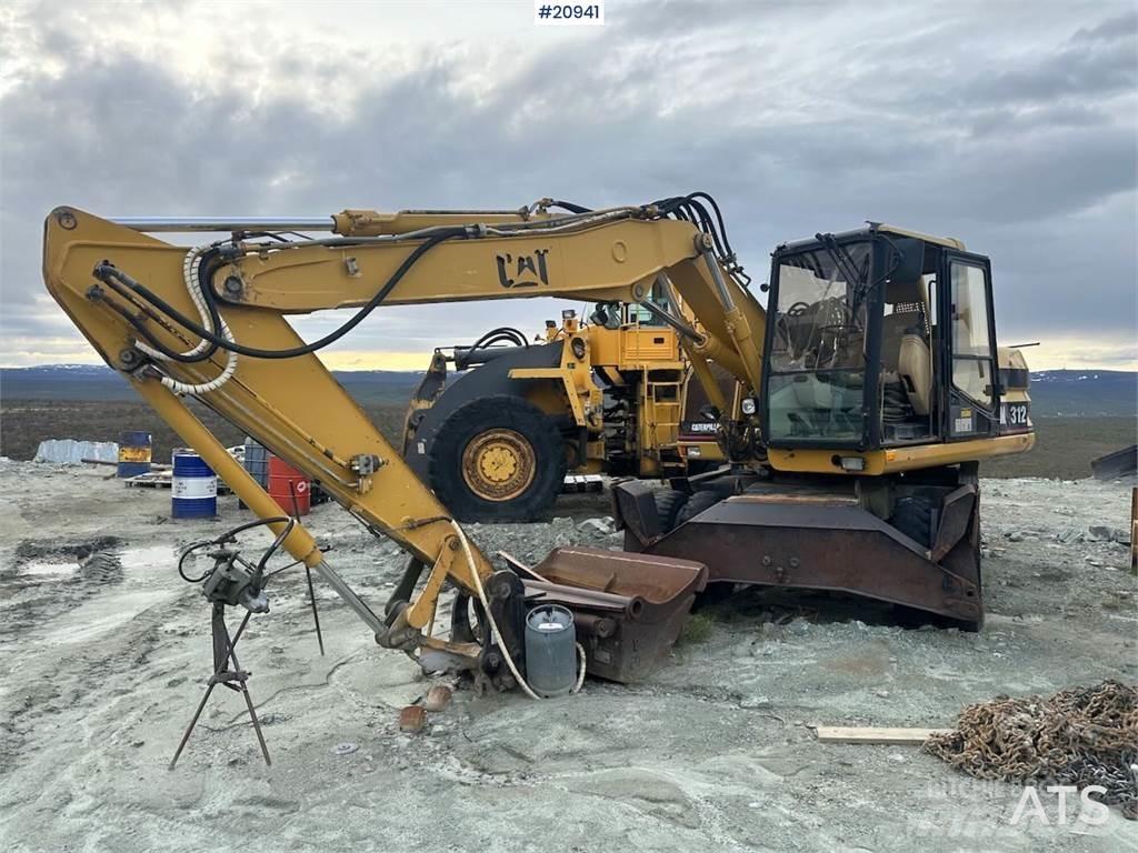 CAT 312 Escavatori gommati