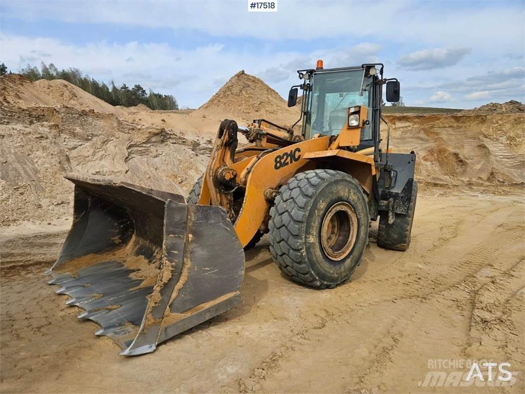 CASE 821C Pale gommate