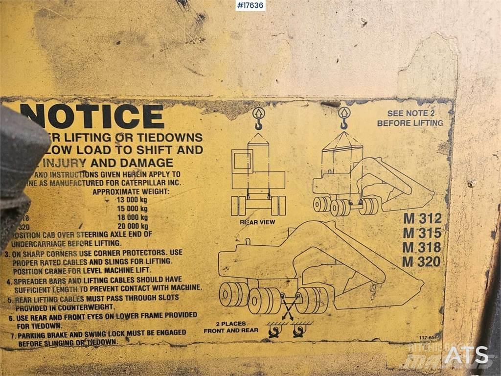 CAT M312 Escavatori gommati