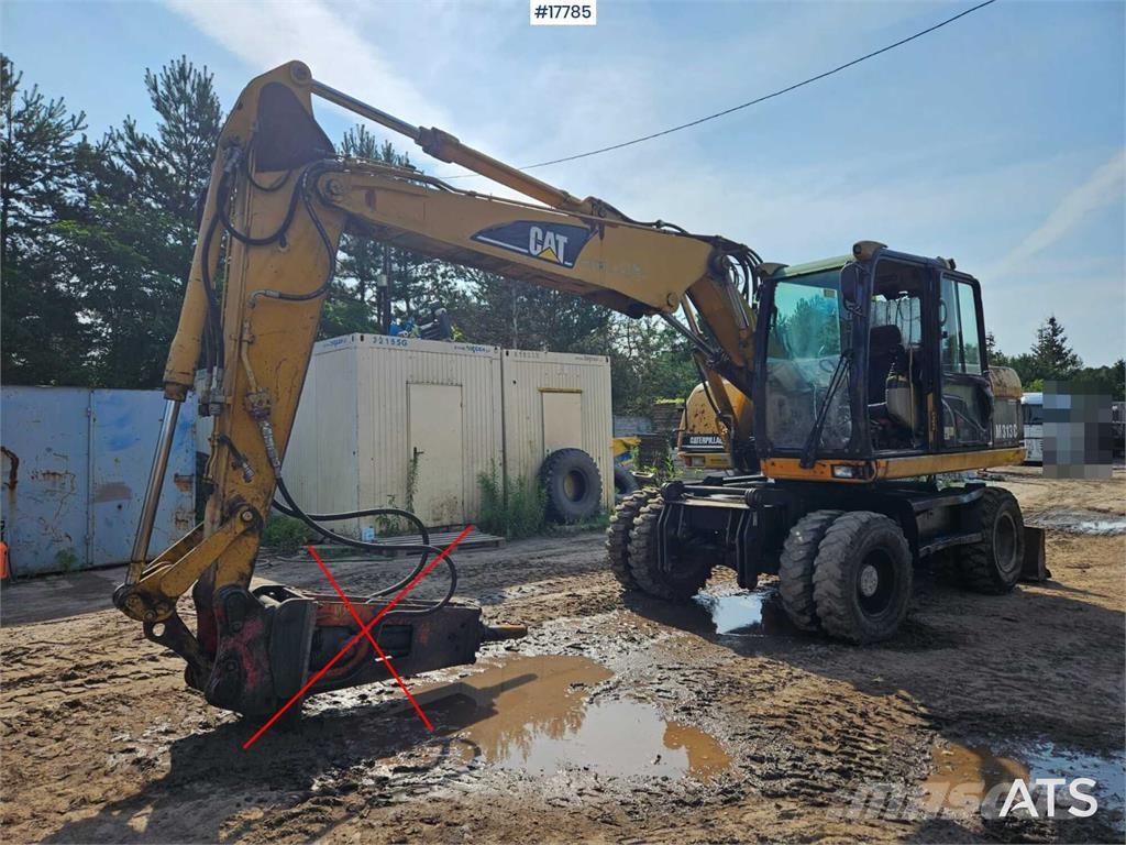 CAT M313 C Escavatori gommati