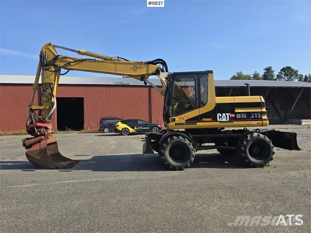 CAT M315 Escavatori gommati