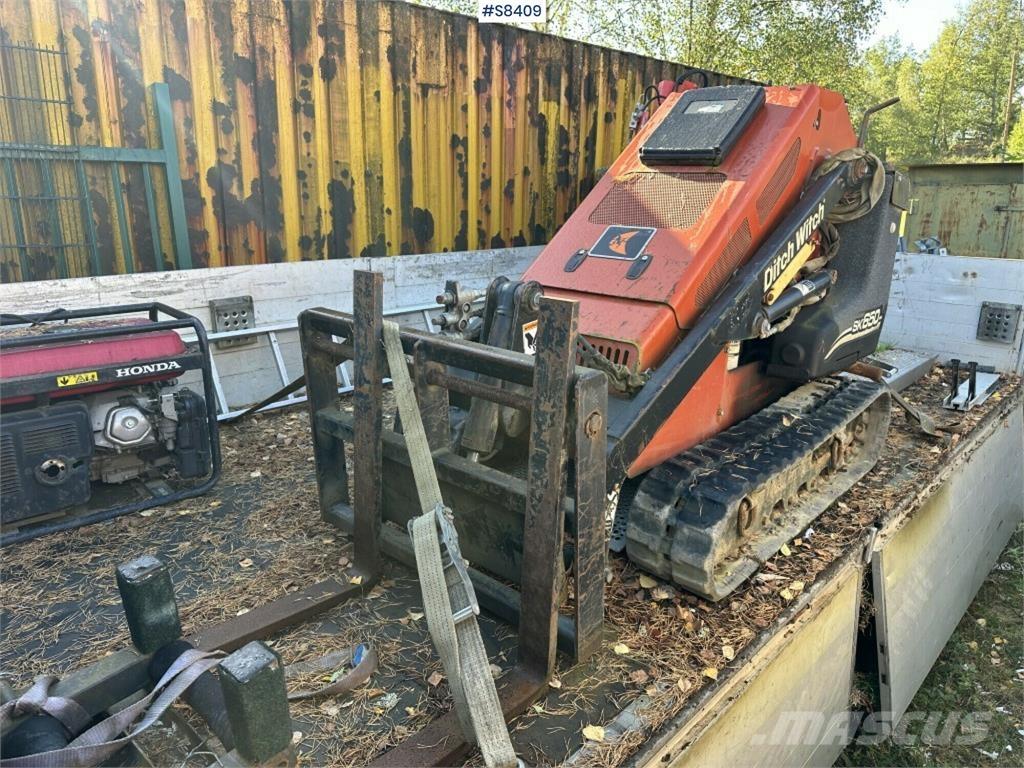 Ditch Witch SK650 Mini Pale Gommate
