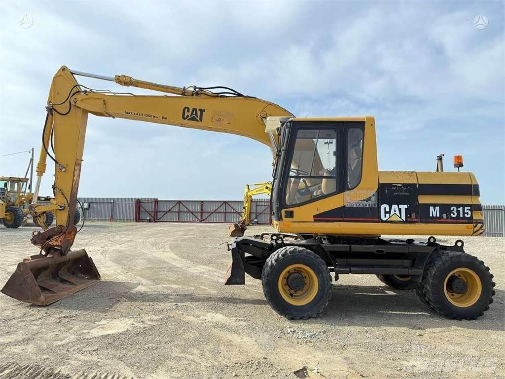 CAT M 315 Escavatori gommati