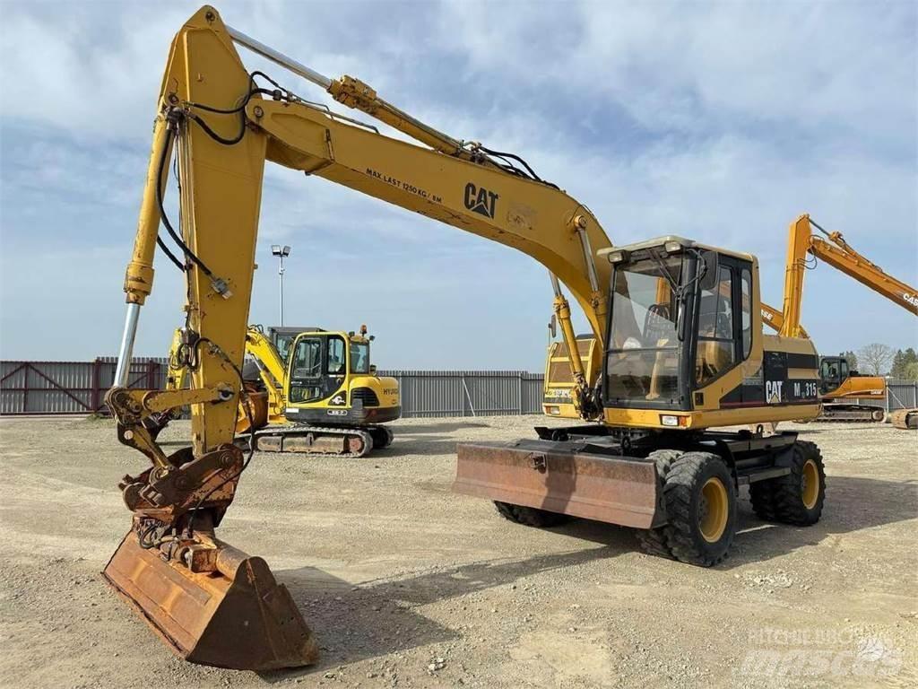 CAT M 315 Escavatori gommati