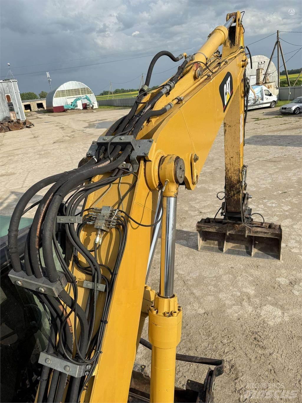CAT M315C Escavatori gommati