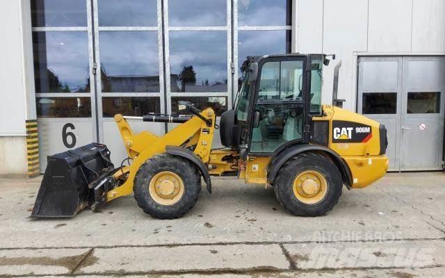 CAT 906M Pale gommate