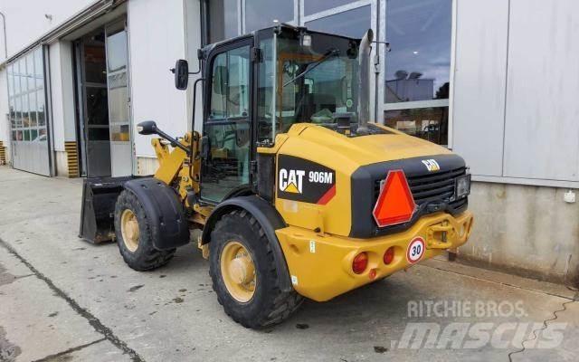 CAT 906M Pale gommate