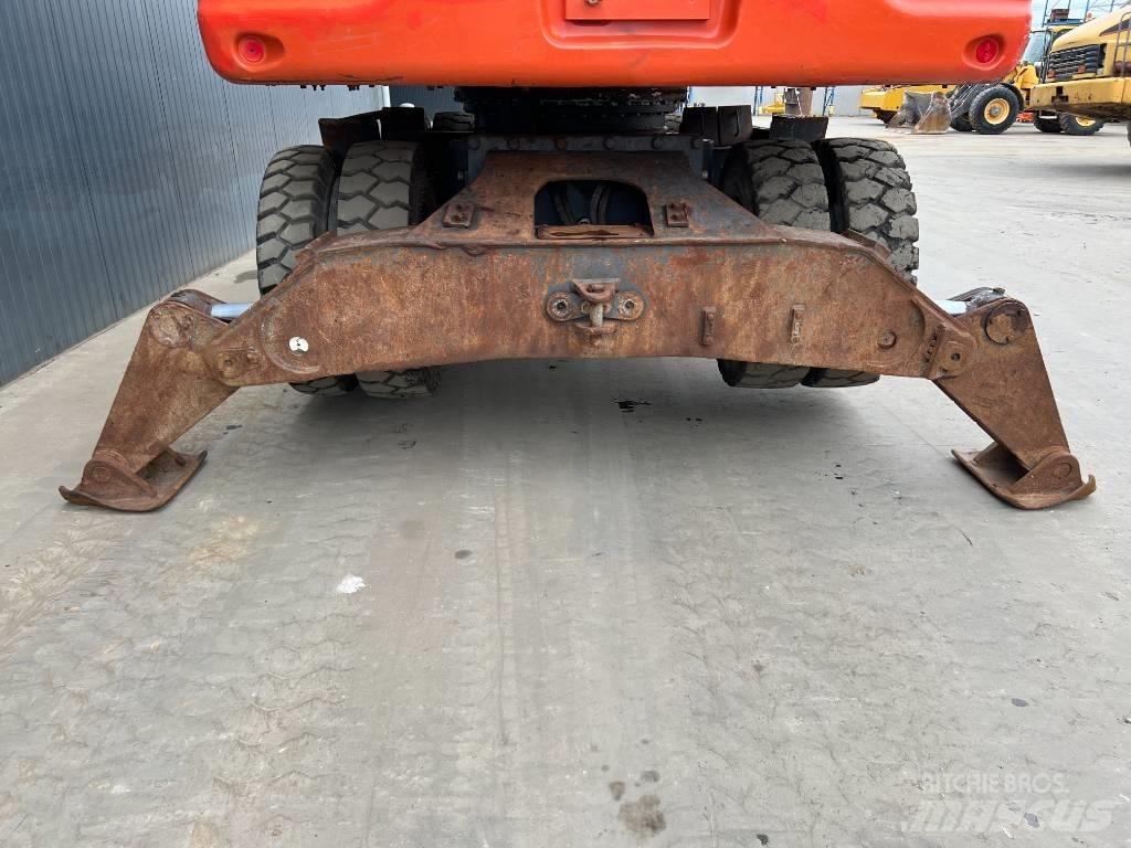 Doosan DX210W Escavatori gommati
