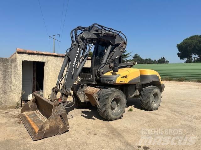 Mecalac 12 MTX Escavatori gommati