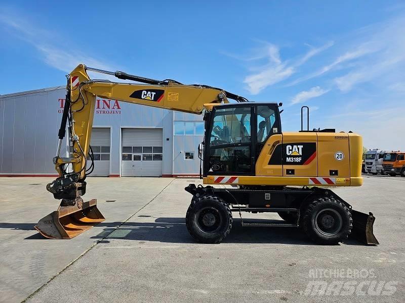 CAT M 318 F Escavatori gommati