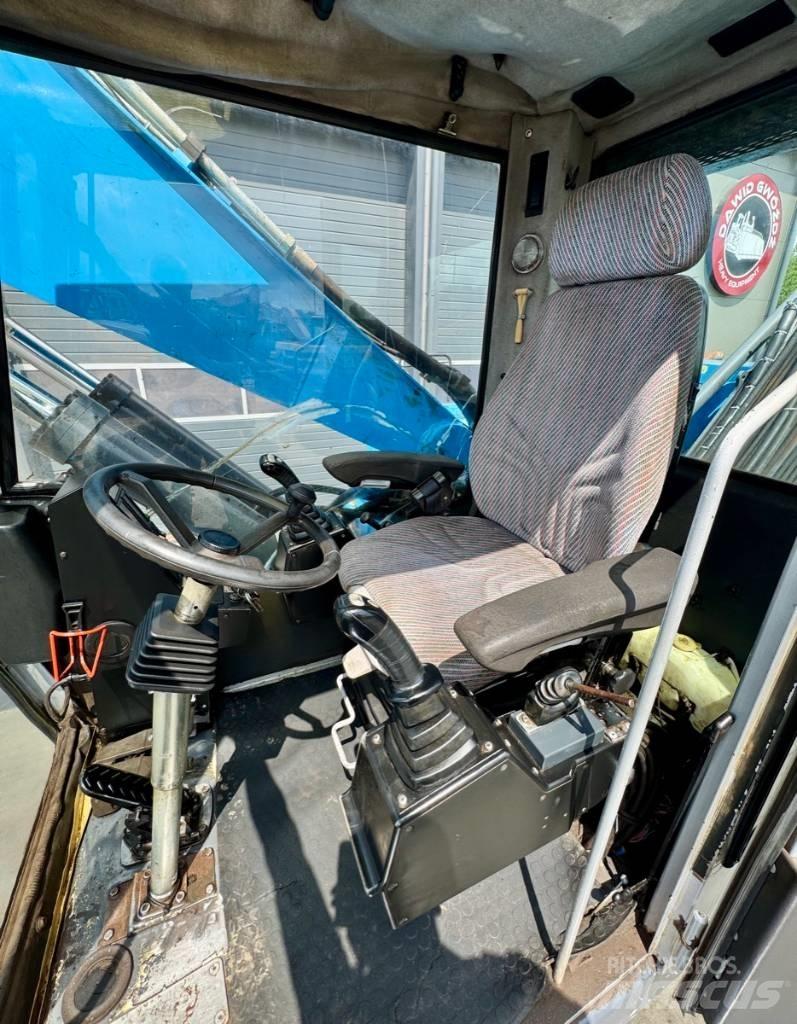 Fuchs MHL 331 Movimentazione rifiuti