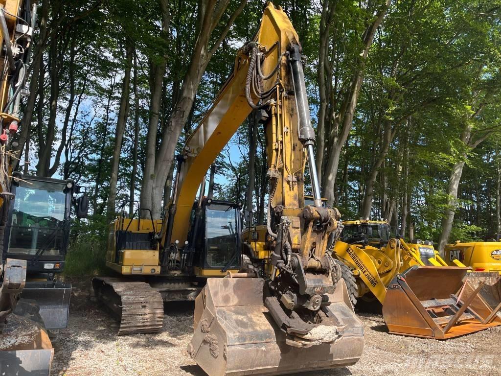 CAT 323 Escavatori cingolati