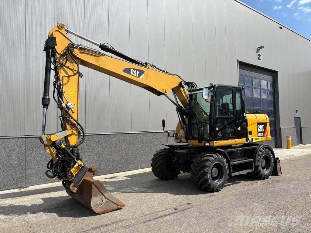CAT M 313 D Escavatori gommati