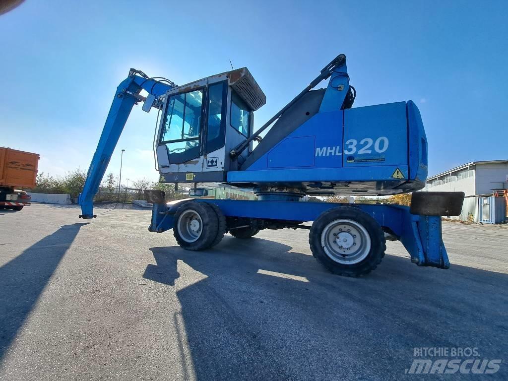 Fuchs MHL 320D Movimentazione rifiuti