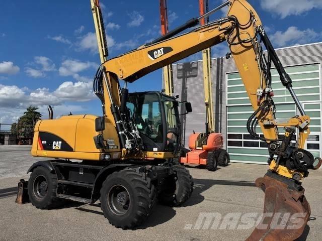 CAT M 313 D Escavatori gommati