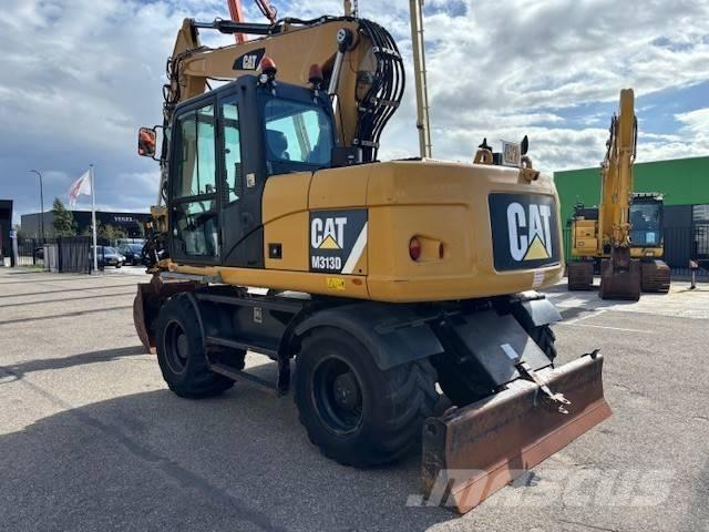 CAT M 313 D Escavatori gommati