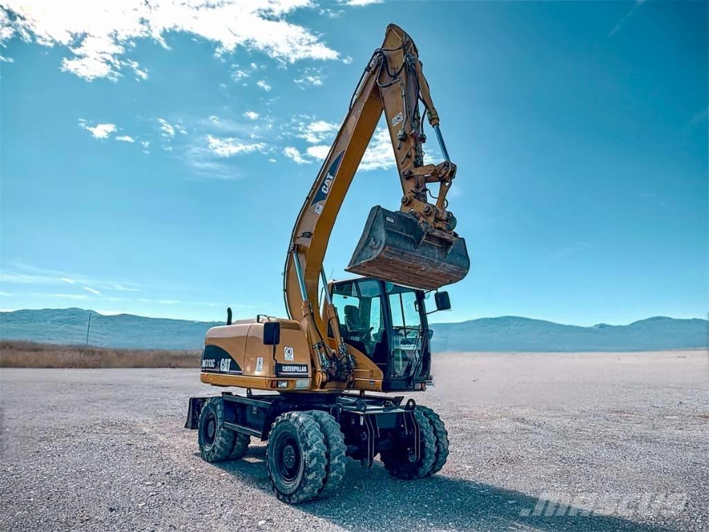 CAT M 313 C Escavatori gommati