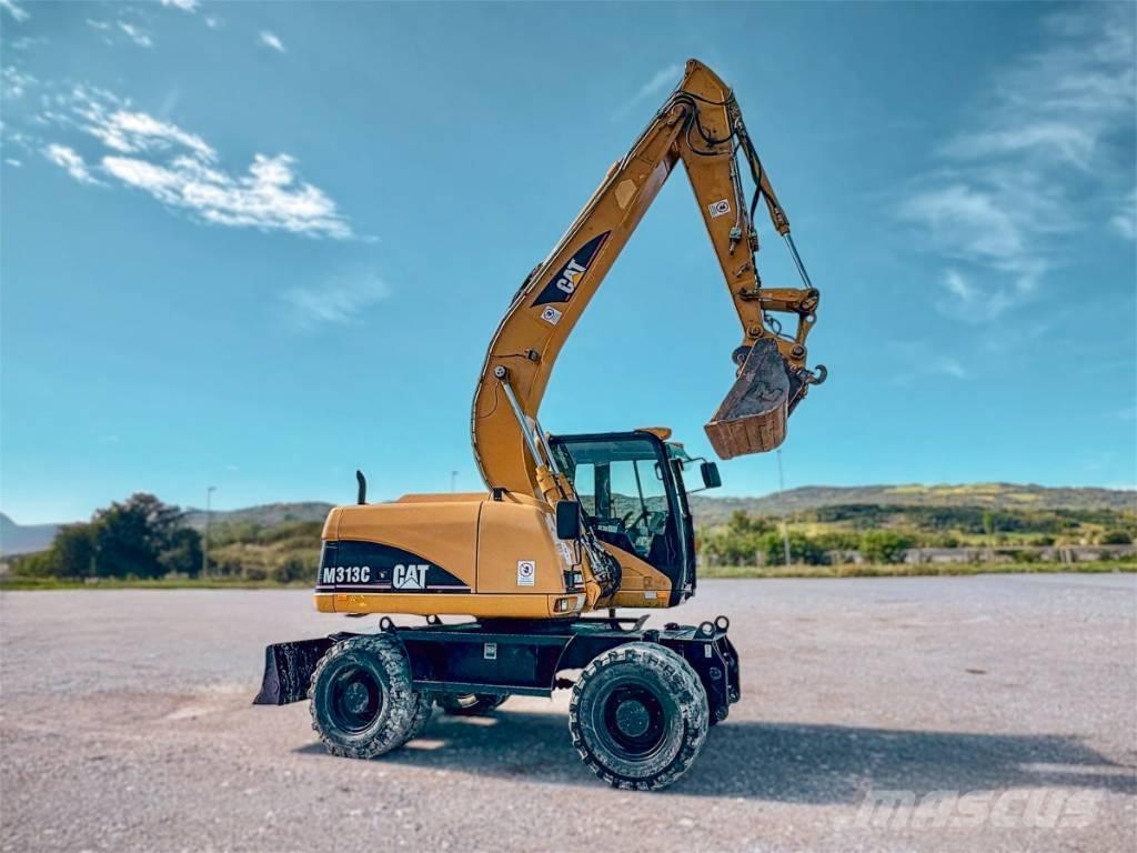 CAT M 313 C Escavatori gommati