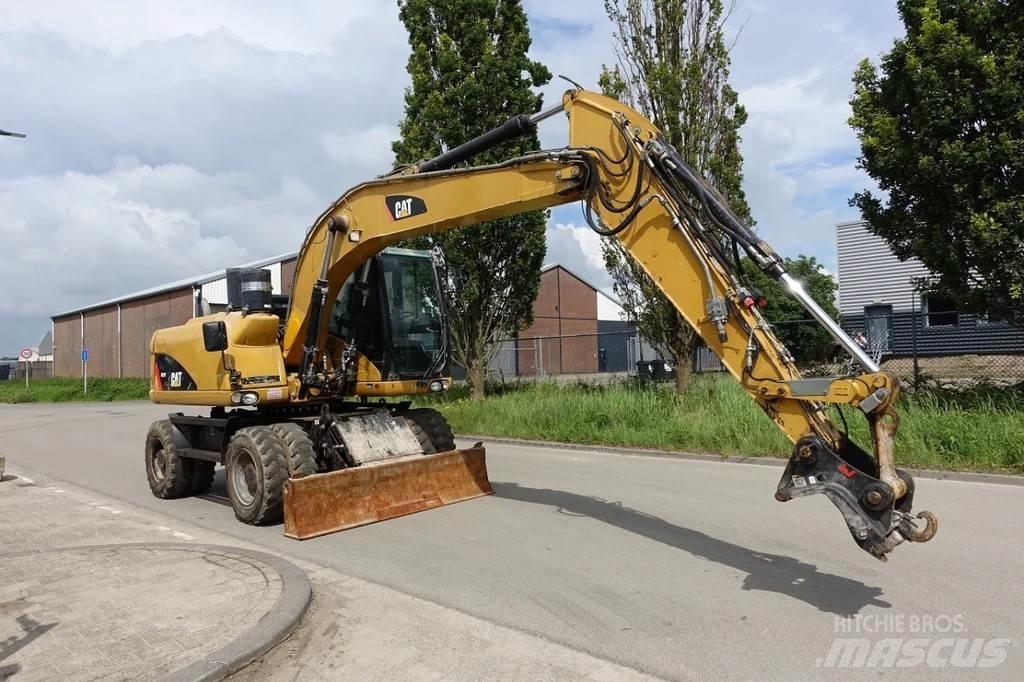 CAT M313 D Escavatori gommati