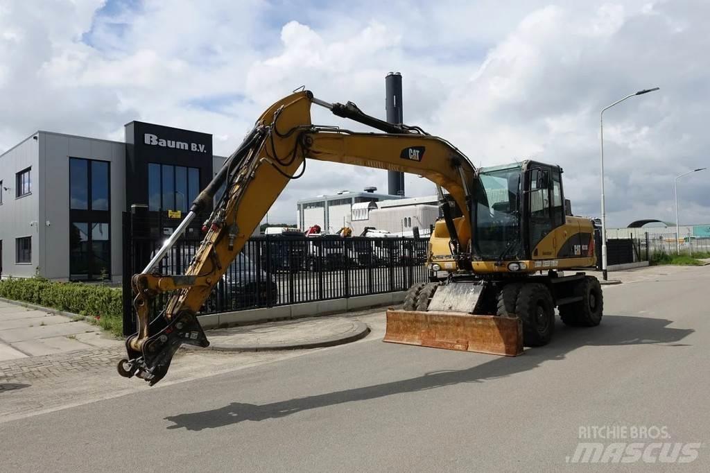 CAT M313 D Escavatori gommati
