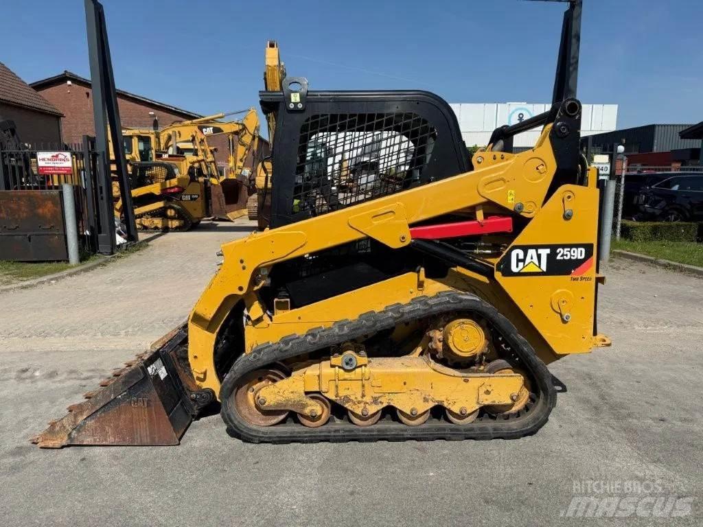 CAT 259D Mini Pale Gommate