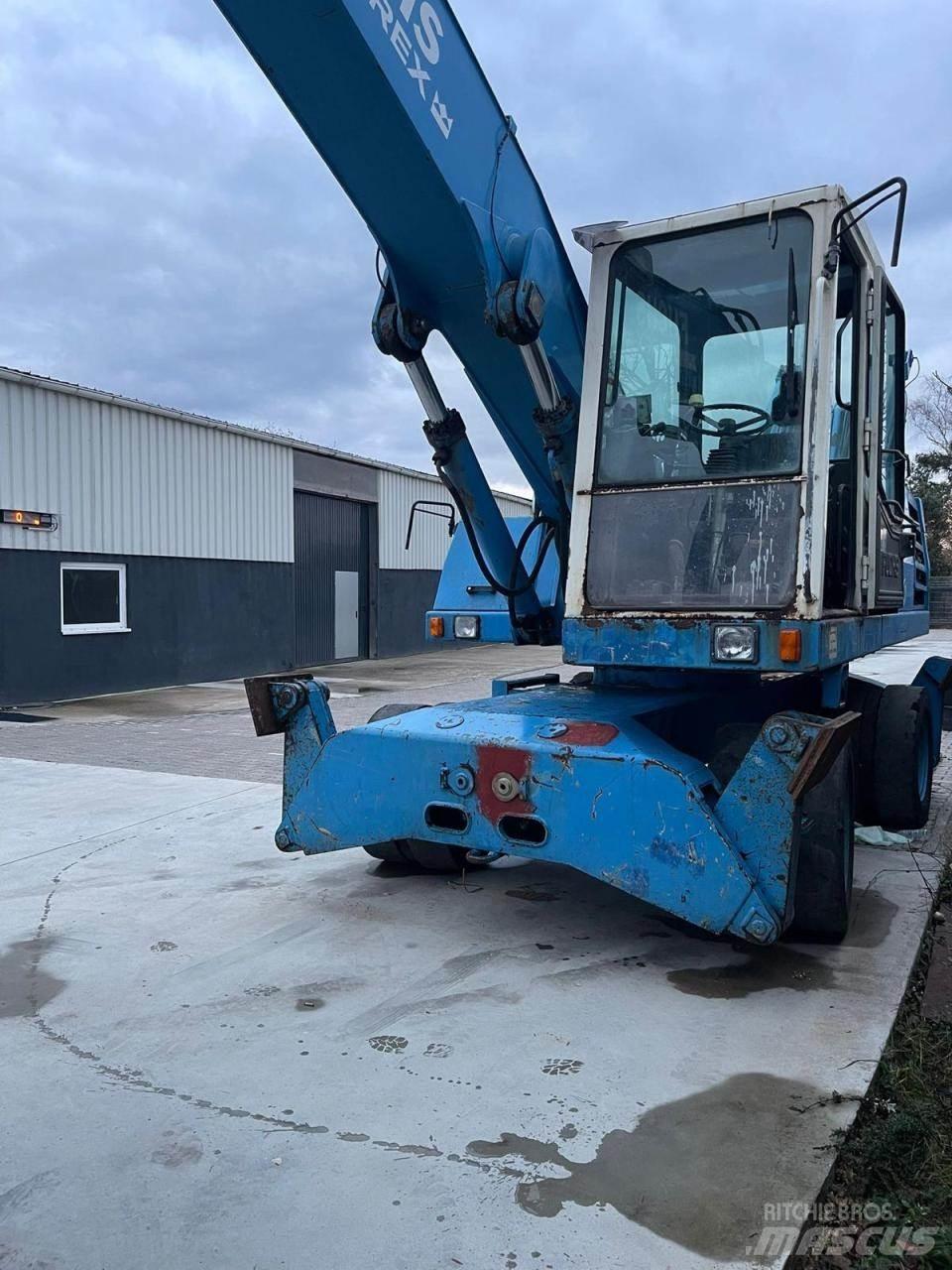 Fuchs MHL 331 Escavatori gommati