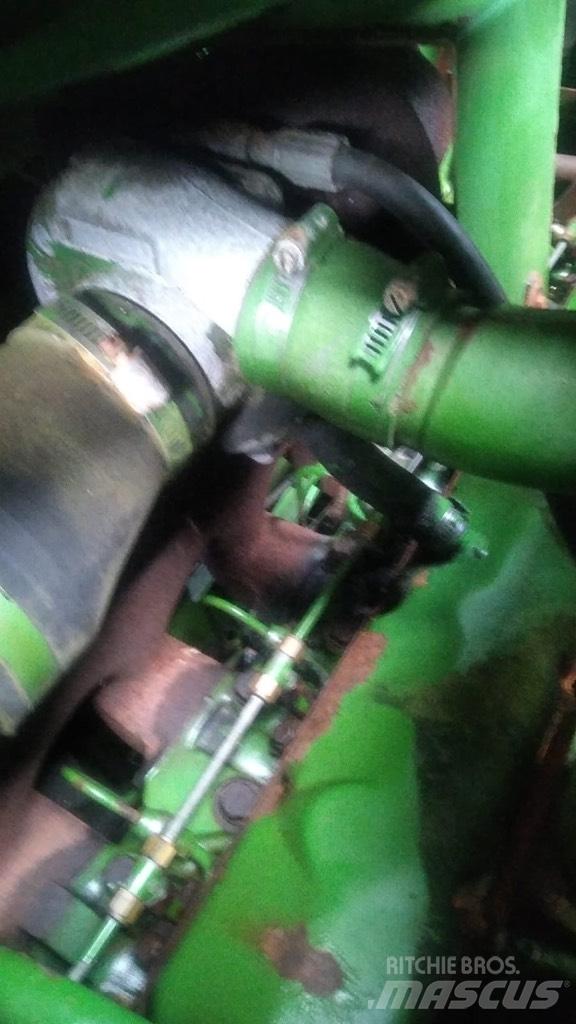 John Deere 1065 Mietitrebbiatrici