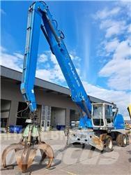 Fuchs MHL350E + Polyp Movimentazione rifiuti