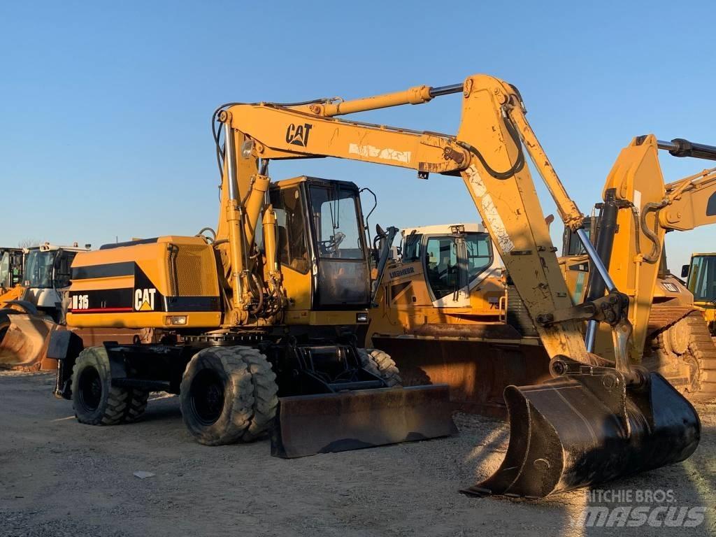 CAT M 315 Escavatori gommati