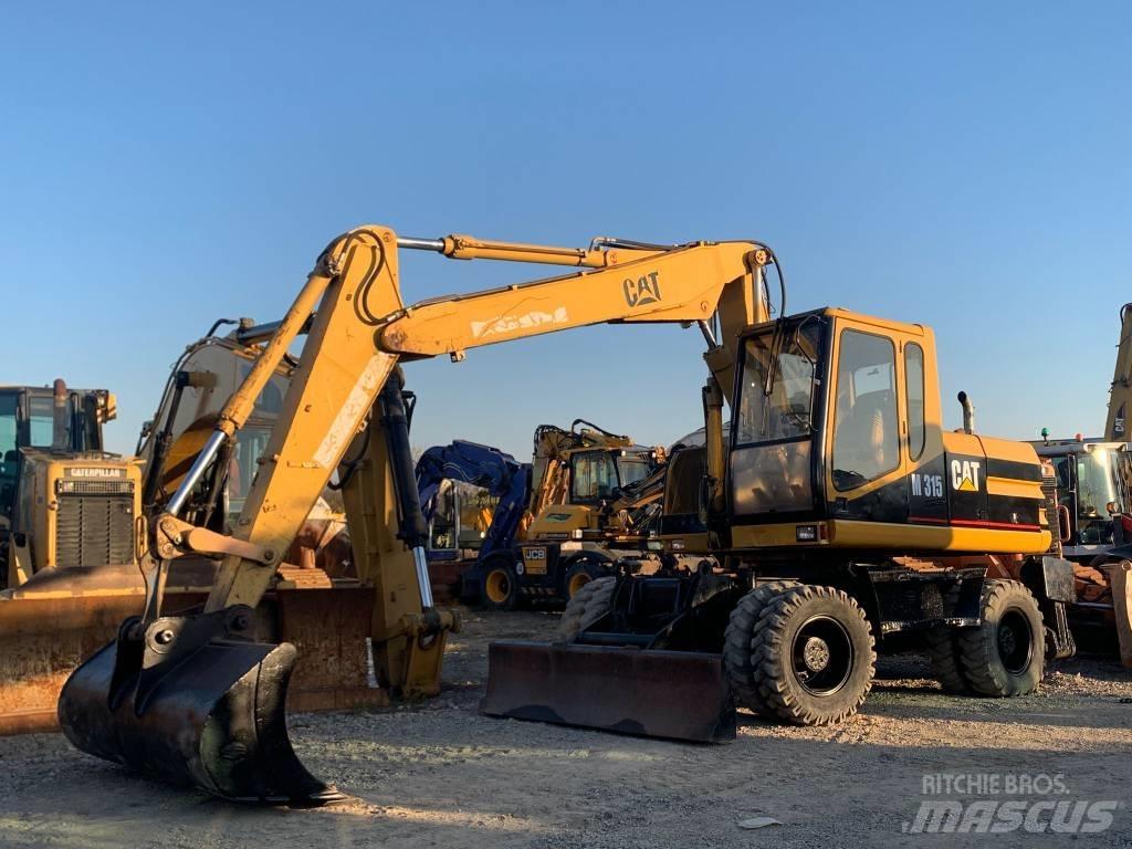 CAT M 315 Escavatori gommati