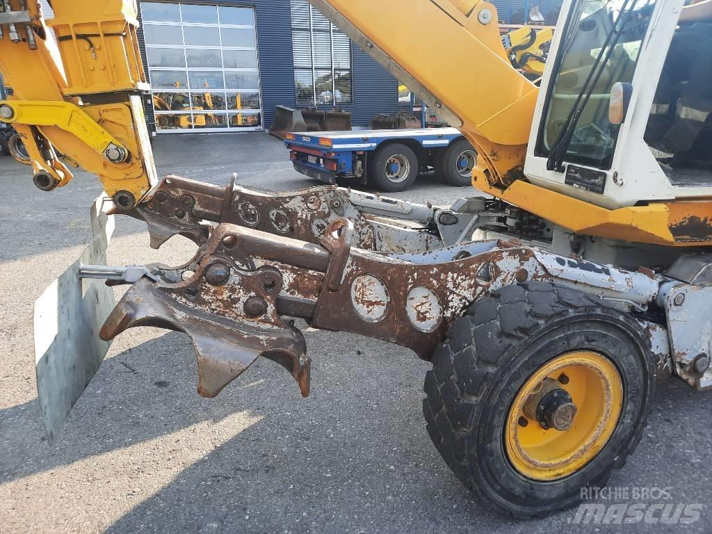 Menzi Muck M525 Escavatori gommati