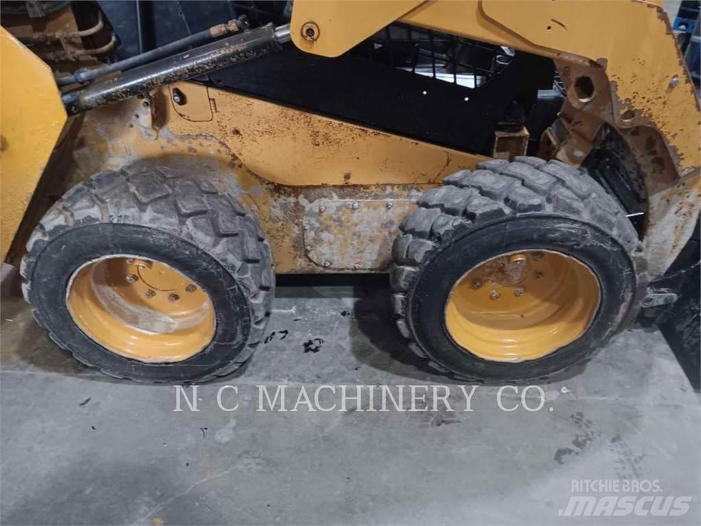 CAT 236D H2CN Mini Pale Gommate