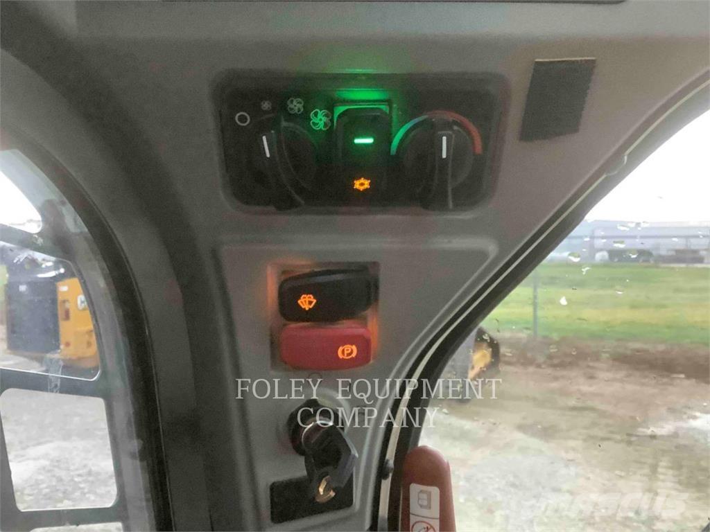 CAT 259D3STD2C Mini Pale Gommate