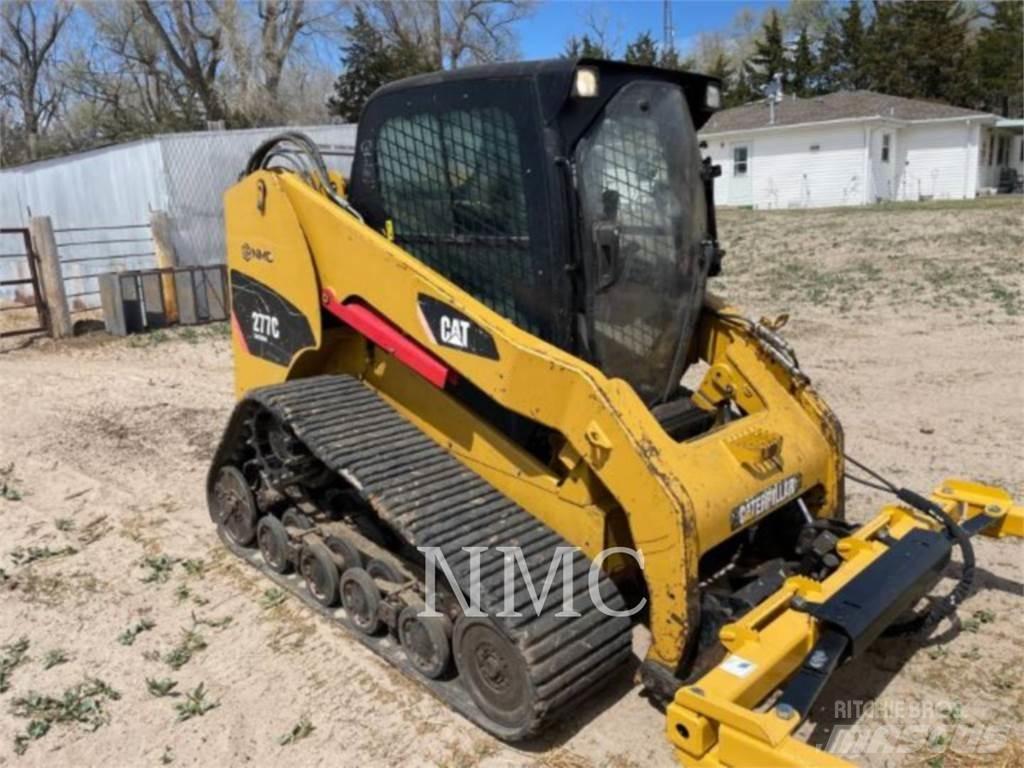 CAT 277C Mini Pale Gommate